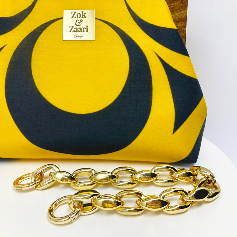 Zok and Zaar Yellow Digital Printed Handmade Handbag with gold wrist chain